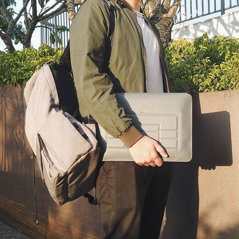 Three-In-One Hand Pad With Stand Laptop Bag